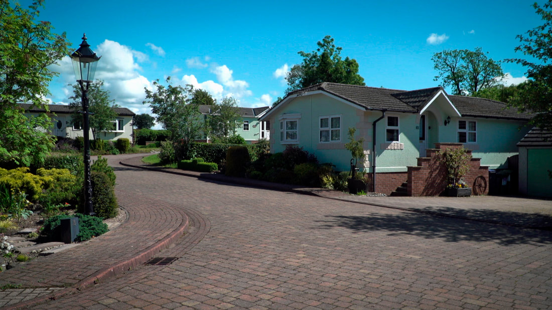 Sett-stone road and pathway between homes on the Millbanks Court development.